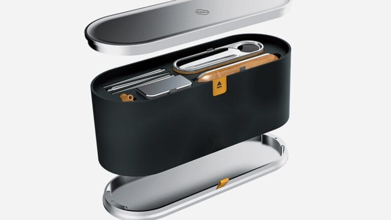 Video conferencing terminal development — open carrying case revealing the terminal and accessories, demonstrating compact and portable design