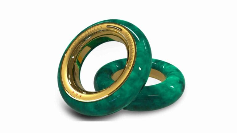 Smart bracelet development — pair of green jade-textured bracelets showing sleek circular form factor