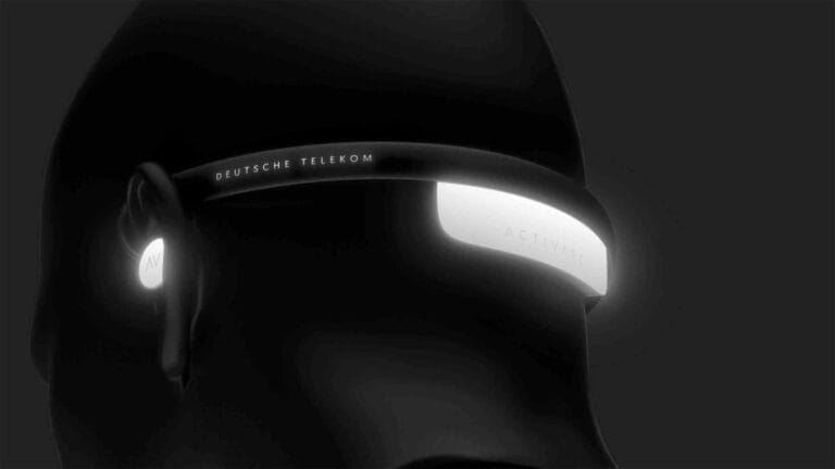 Translation headphones development — curved black head-worn module with integrated white LED light strip