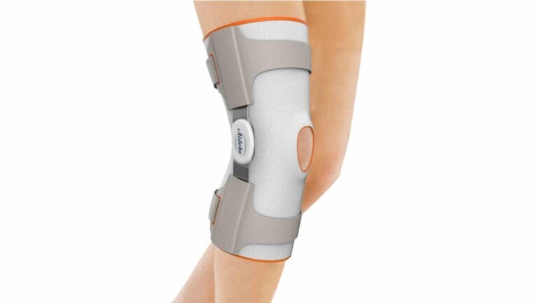 Knee brace development — adjustable stabilizing brace worn on leg showing ergonomic fit and dual-adjustment straps
