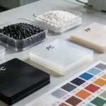 ABS PC PP plastic pellets and material samples in professional product design workshop